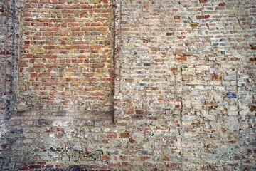 Ausgebessertes altes Mauerwerk aus Backstein in Beige und Naturfarben in den Gassen der Altstadt der Unesco Werlterbestadt Brügge in Westflandern in Belgien © Martin Debus