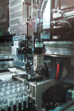 Advanced Vision System Scans Vials For Defects Using AI Analysis And Highresolution Imaging