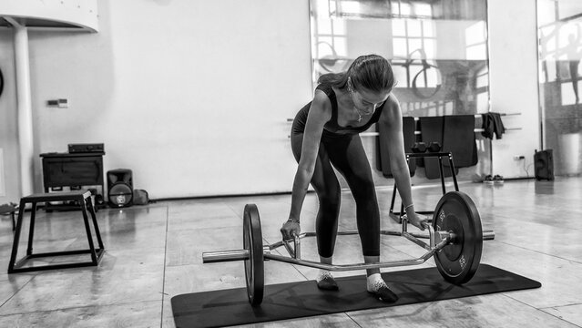 Physical rehabilitation exercises with weights in the gymnasium