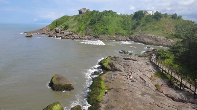 Rocky Coastal Trail Surrounded by Tropical Nature