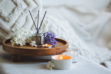Comfortable atmosphere, spring delicious fresh smell. Aroma diffuser, burning candle, blooming...