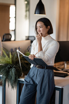 Professional asian businesswoman thinking planning business project