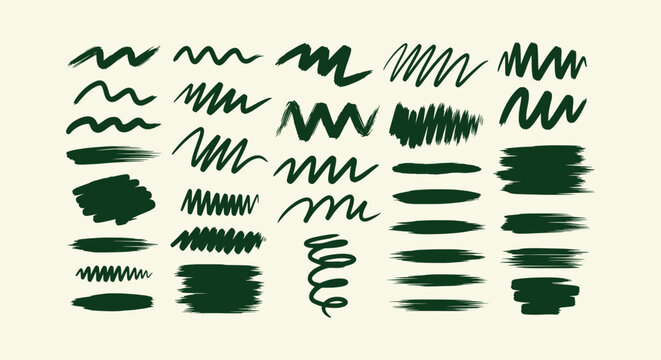 Collection of dark green hand-drawn artistic brush strokes scribbles and zigzags for design layout