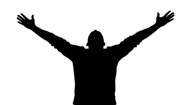 Silhouette of a person raising arms celebrating victory, joy, and triumph