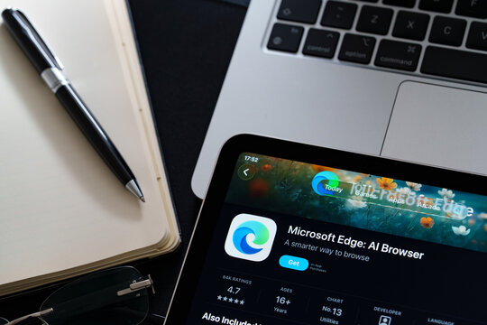 Microsoft Edge iPad App Store screen showing Apple Liquid Glass redesign and iOS 26 style in workspace closeup. Stafford, United Kingdom, April 13, 2026.