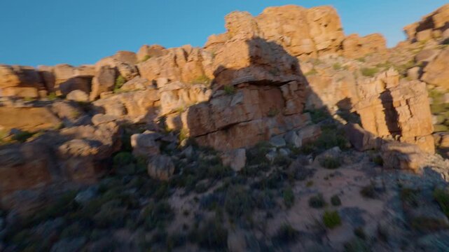 FPV Drone Cinematic Flight Over Red Sandstone Rock Formations in Cederberg Wilderness Area, Western Cape, South Africa