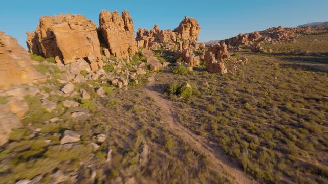 FPV Drone Cinematic Flight Over Red Sandstone Rock Formations in Cederberg Wilderness Area, Western Cape, South Africa
