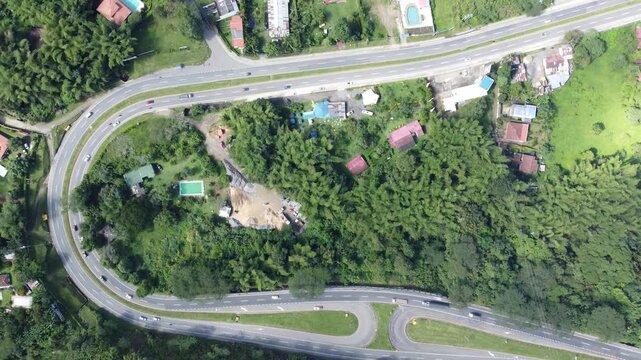 Top view road timelapse la vega cundinamarca colombia curve, intersection trucks and cars on road