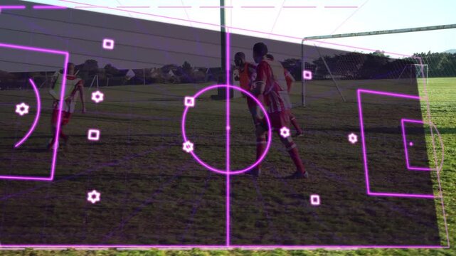Four male soccer players holding ball, starting drill while magenta overlay mapping passing lanes