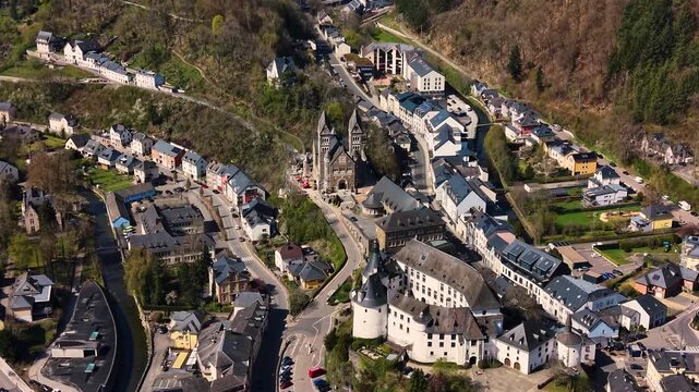 A panoramic Aerial view of the city and castle  Clervaux in Luxembourg, on a sunny spring noon