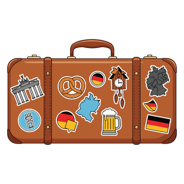 Vintage suitcase adorned with Germany-themed stickers, ready for travel and exploration. The stickers showcase iconic symbols and a map of Germany