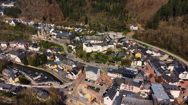 A panoramic Aerial view of the city and castle  Clervaux in Luxembourg, on a sunny spring noon