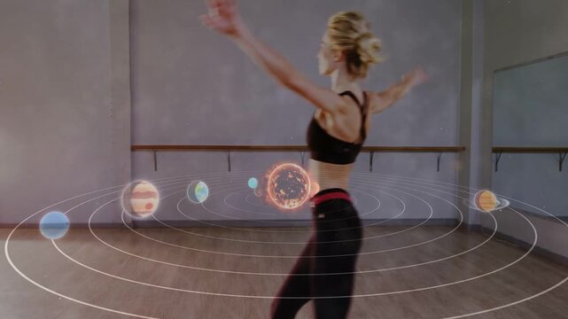 Vertical video: Dancer entering and performing turns, syncing with solar hologram for education