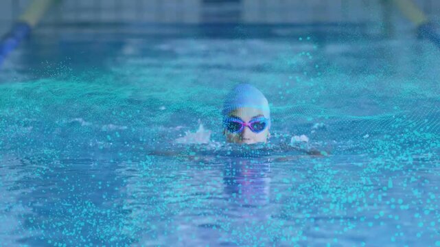 Swimmer breaststroking to camera, lifting head to inhale, training, turquoise particles overlaying