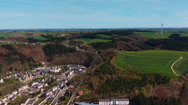 A panoramic Aerial view of the city and castle  Clervaux in Luxembourg, on a sunny spring noon