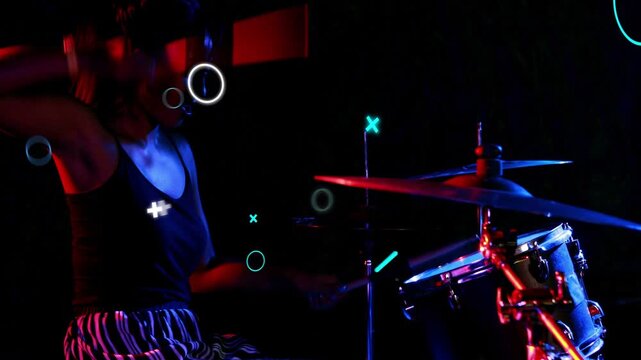 Woman drummer raising sticks, striking cymbal and toms, animated shapes accenting cymbal for music
