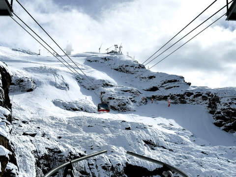 Cable Car Ascending Snowy Mount Titlis, Engelberg, Switzerland