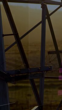 Vertical video: Colorful bars shifting right and fading on start, revealing tower showing data