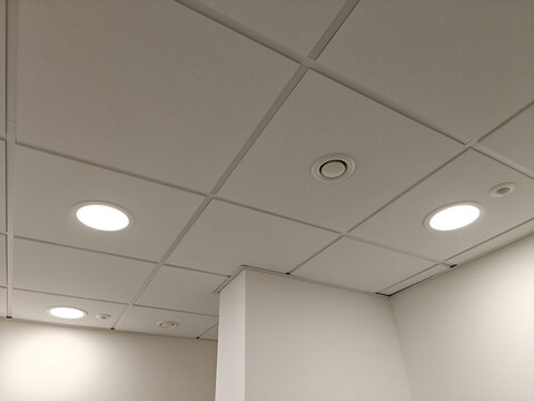 Exhaust ventilation in the ceiling part near a light in the interior.