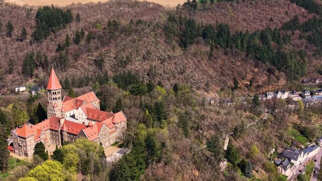 A panoramic Aerial view of the city and castle  Clervaux in Luxembourg, on a sunny spring noon