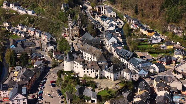 A panoramic Aerial view of the city and castle  Clervaux in Luxembourg, on a sunny spring noon