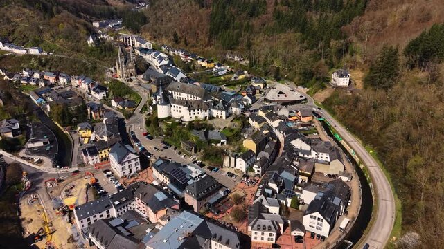 A panoramic Aerial view of the city and castle  Clervaux in Luxembourg, on a sunny spring noon