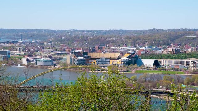 NFL draft stage setup at Acrisure Stadium in Pittsburgh with river view and city backdrop