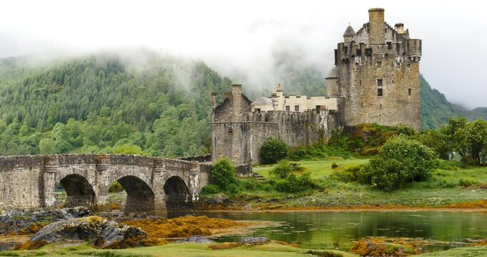 European old stone castle and fortress architecture, medieval towers and turrets, historic landmark in scenic landscape.