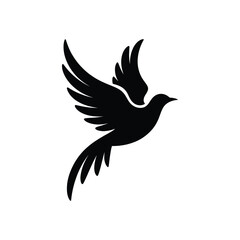 Fototapeta premium Black silhouette of a bird in flight flying wings spread