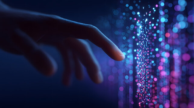 Human hand touching digital data particles in virtual reality space with bokeh lights.