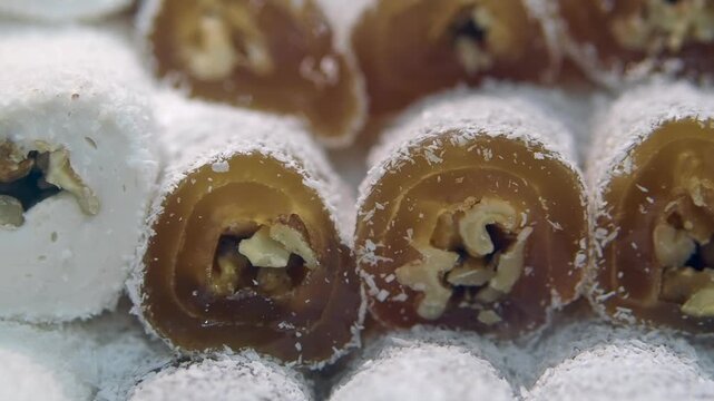 Making Turkish delight with nuts and coconut