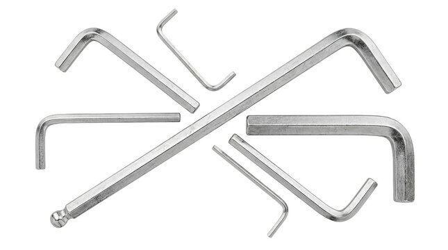 Scattered metallic hex key and Allen wrench set, displaying various sizes and designs on a transparent background.