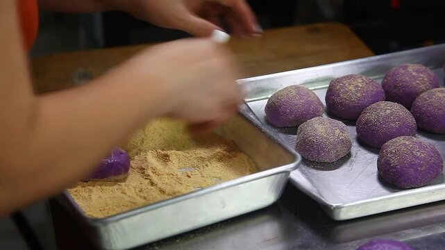 Ube cheese pandesal being prepared for baking