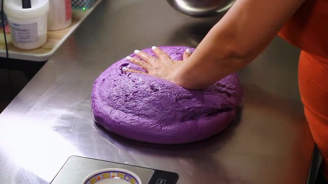 Ube cheese pandesal being prepared for baking