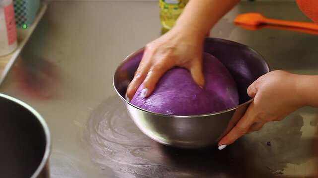Ube cheese pandesal being prepared for baking