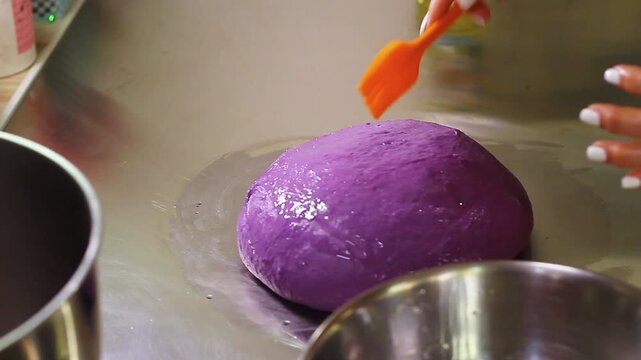 Ube cheese pandesal being prepared for baking