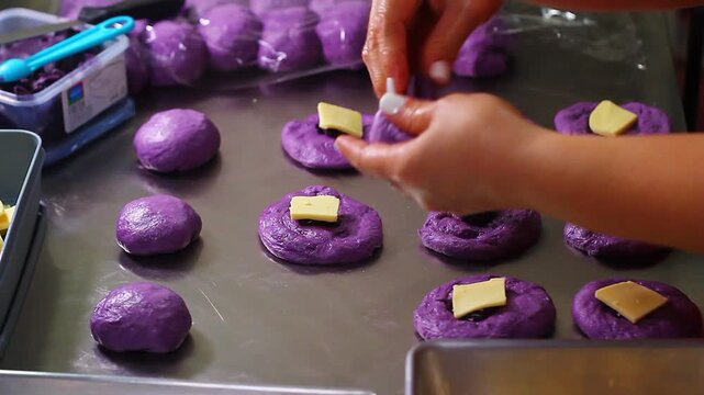 Ube cheese pandesal being prepared for baking