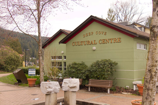 Deep Cove Cultural Centre building exterior with signage on oliv