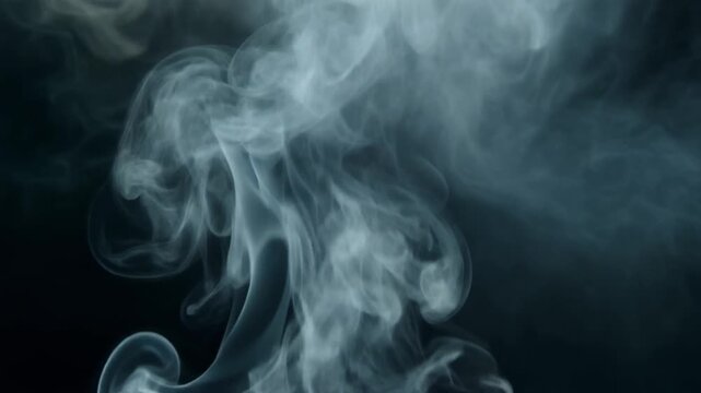 Serene Smoke Wisps Dancing in Dark Background.