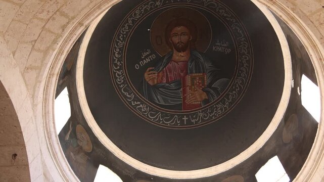 Circular religious fresco on the ceiling of the ancient Monastery in Ma'aloula, Syria. Detailed Christian Orthodox sacred art and historic spiritual heritage