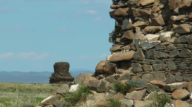 Mongolia, the ruins of the ancient city of Karabalghasun and old Stupa. Summer sunny day.   
