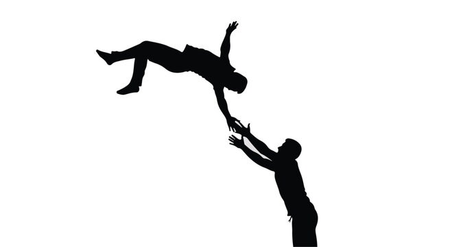 Silhouette of one person reaching out to catch another falling person, symbolizing trust and support.