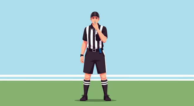 Referee standing on sports field.