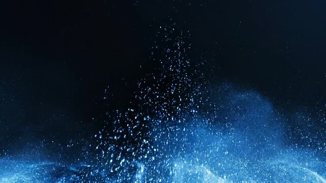 Glowing tidal wave surges under dark night sky with sparkling particles 4k video