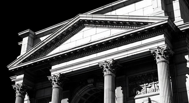 Ornate, neoclassical building exterior with columns, pediment, and detailed architectural elements