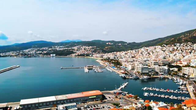 Aerial drone video of kavala city and port on sunny day, greece, establishing shot, motion.