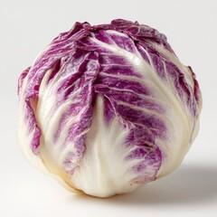 Obraz premium Fresh Radicchio Lettuce With Vibrant Purple Leaves and White Centers On White Background