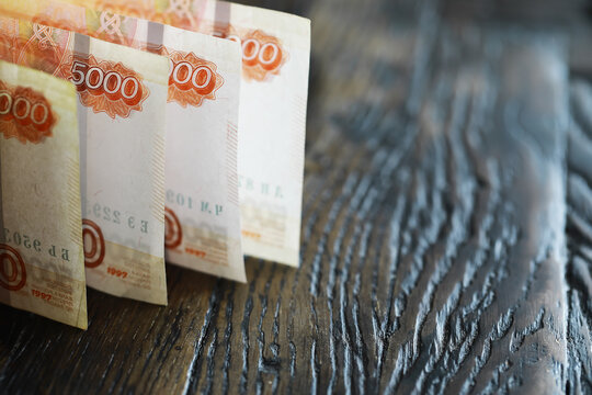 Banknotes with inscription "five thousand rubles". Russian money face value of five thousand rubles. Close-up of Russian rubles . The concept of Finance.Background and texture of money