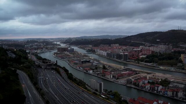 Aerial footage of Nervion river nearby Bilbao in the Basque Country. High quality 4k drone footage
