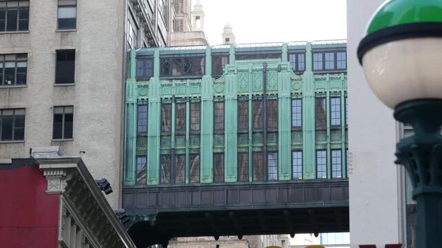 New York City Gimbels bridge, Manhattan Midtown, United States of America. Skybridge on Broadway, Herald Square, USA. Gimbels traverse, 6 avenue. Historic elevated walkway 1925, Subway metro orb globe